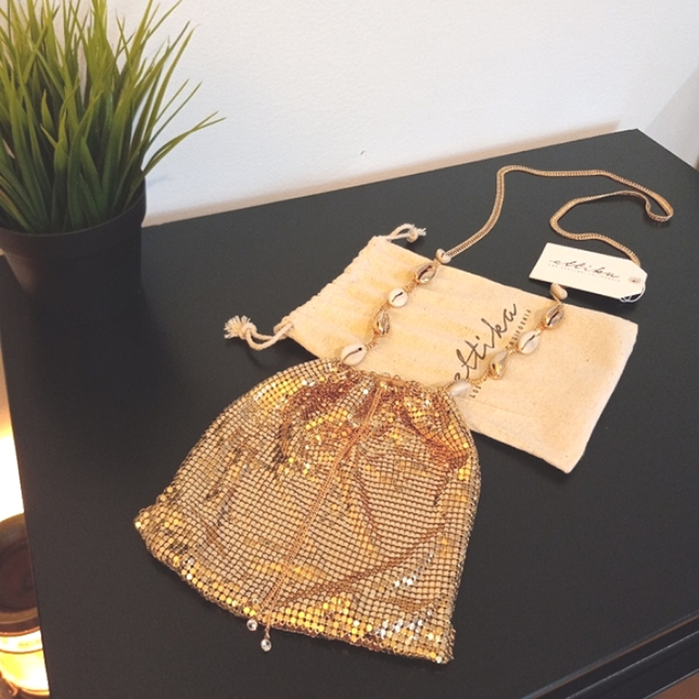 Ettika pouch